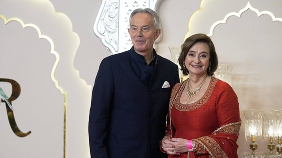Tony Blair, ehemaliger Premierminister des Vereinigten Königreichs, und seine Ehefrau Cherie Blair