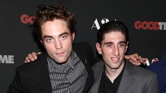 Buddy Duress und Robert Pattinson bei einer Premiere