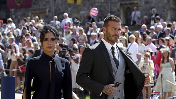 David Beckham im eleganten Dreiteiler mit Ehefrau Victoria Beckham in Windsor.