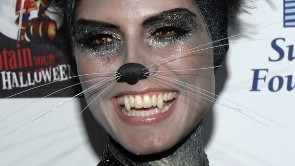 Model Heidi Klum poses on the press line at "Heidi's Halloween Party" in Los Angeles on Wednesday,