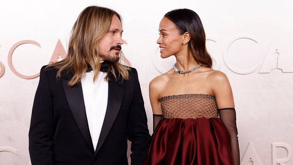 L-R Marco Perego-Saldana und Zoe Saldana bei der Oscar-Gala 2025
