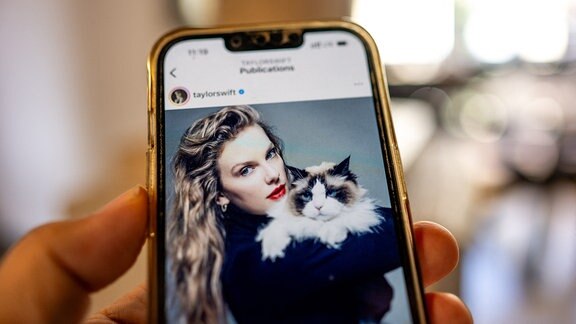 Instagram-Post von Taylor Swift auf einem Smartphone